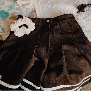 A black and white tennis skirt